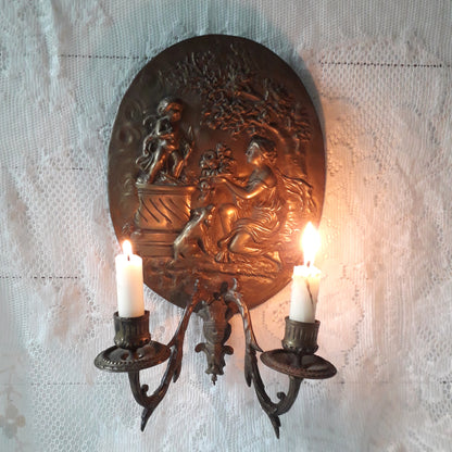 Antique wall mounted decorative candle sconce