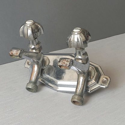Stylish French vintage hot and cold faucet taps that are heavy, quality pieces probably dating from the 1930s time-frame. These old taps are being sold only as a restoration piece or project.