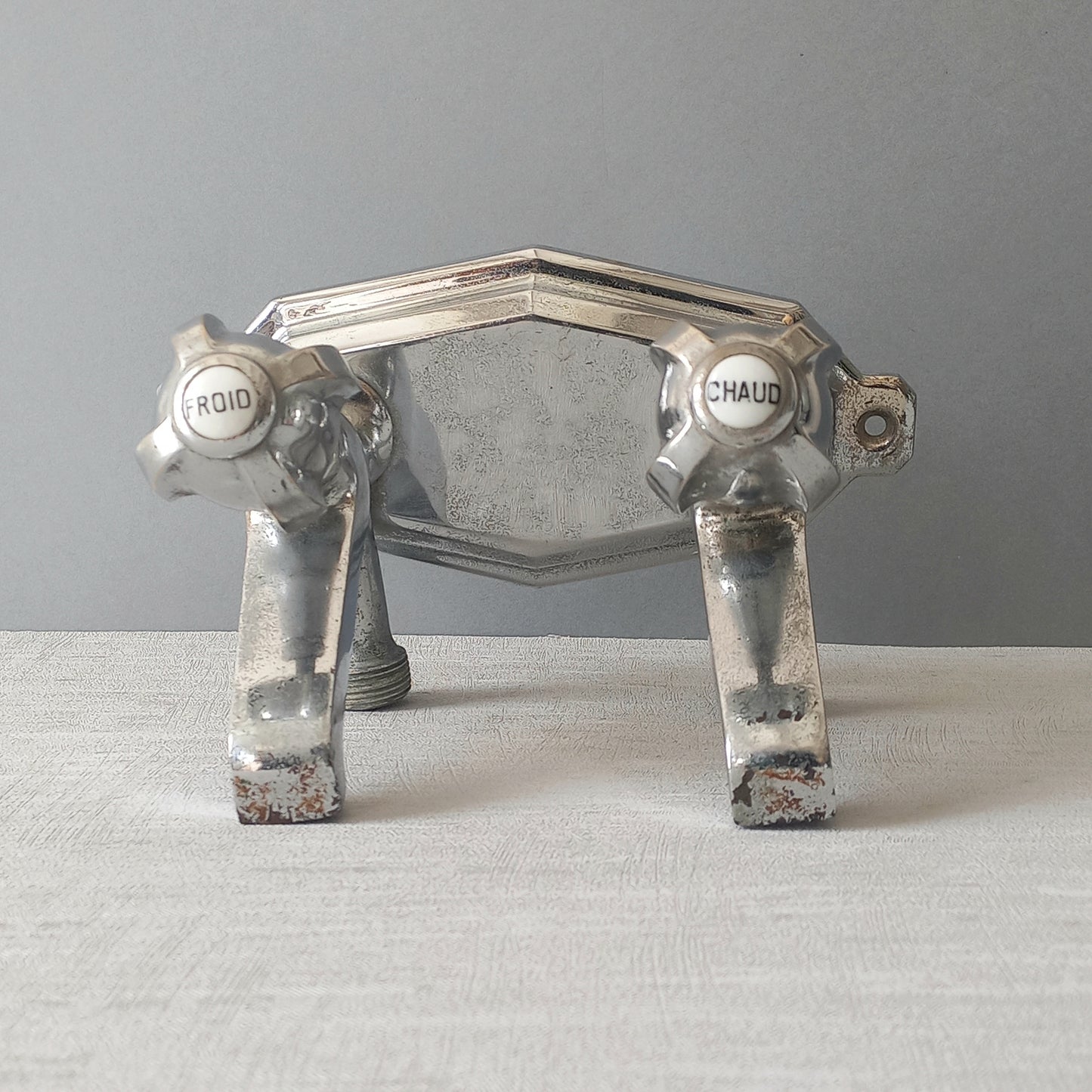 Stylish French vintage hot and cold faucet taps that are heavy, quality pieces probably dating from the 1930s time-frame. These old taps are being sold only as a restoration piece or project.