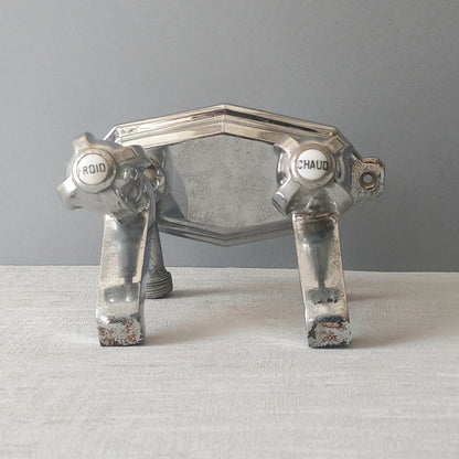 Stylish French vintage hot and cold faucet taps that are heavy, quality pieces probably dating from the 1930s time-frame. These old taps are being sold only as a restoration piece or project.