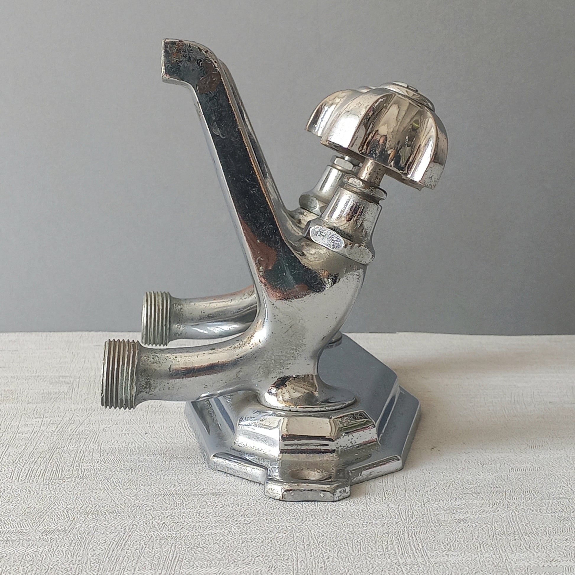 Stylish French vintage hot and cold faucet taps that are heavy, quality pieces probably dating from the 1930s time-frame. These old taps are being sold only as a restoration piece or project.