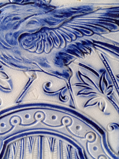 close-up of antique decorative majolica plate by premier Belgian manufacture, Wasmuel.