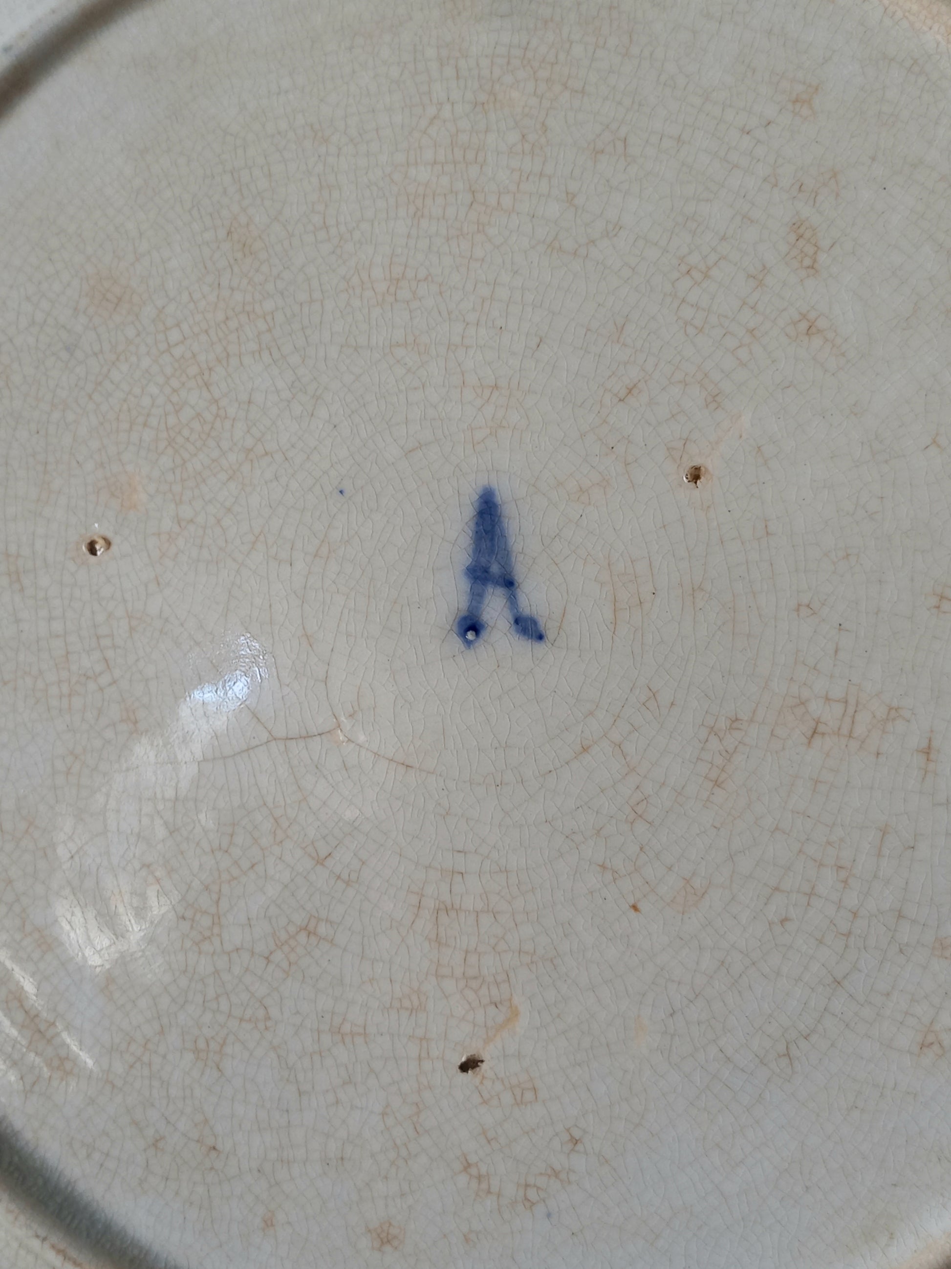 Maker's mark of antique decorative majolica plate by premier Belgian manufacture, Wasmuel.