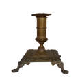 Small decorative antique candle stick holder with four little feet