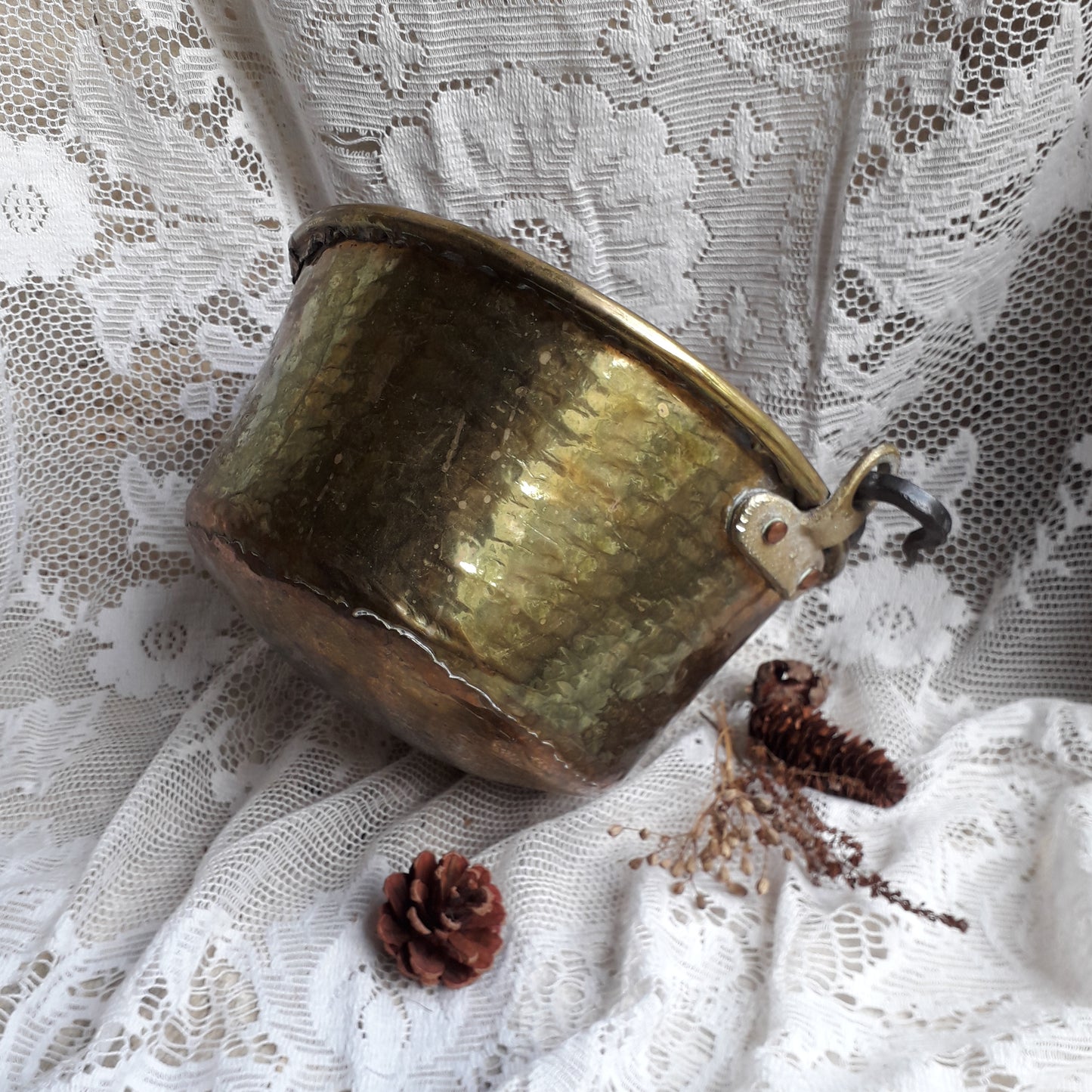A wonderful little French vintage/antique brass hanging cauldron with an iron handle, a quality piece with substantial weight for its size. This delightful piece was hand-made, the joins beneath clearly visible,which makes it all the more charming. It will make a super piece of home decor or a hanging planter.
