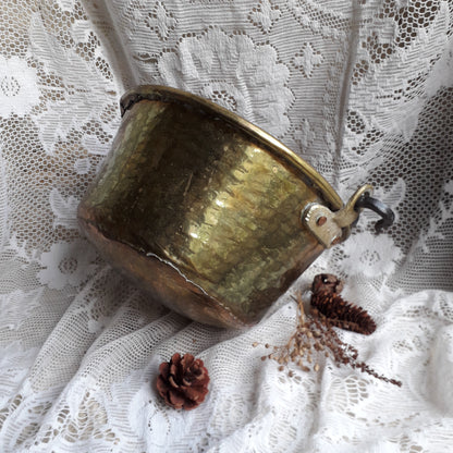 A wonderful little French vintage/antique brass hanging cauldron with an iron handle, a quality piece with substantial weight for its size. This delightful piece was hand-made, the joins beneath clearly visible,which makes it all the more charming. It will make a super piece of home decor or a hanging planter.