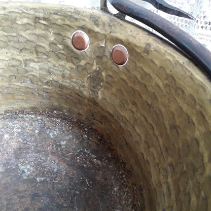 A wonderful little French vintage/antique brass hanging cauldron with an iron handle, a quality piece with substantial weight for its size. This delightful piece was hand-made, the joins beneath clearly visible,which makes it all the more charming. It will make a super piece of home decor or a hanging planter.