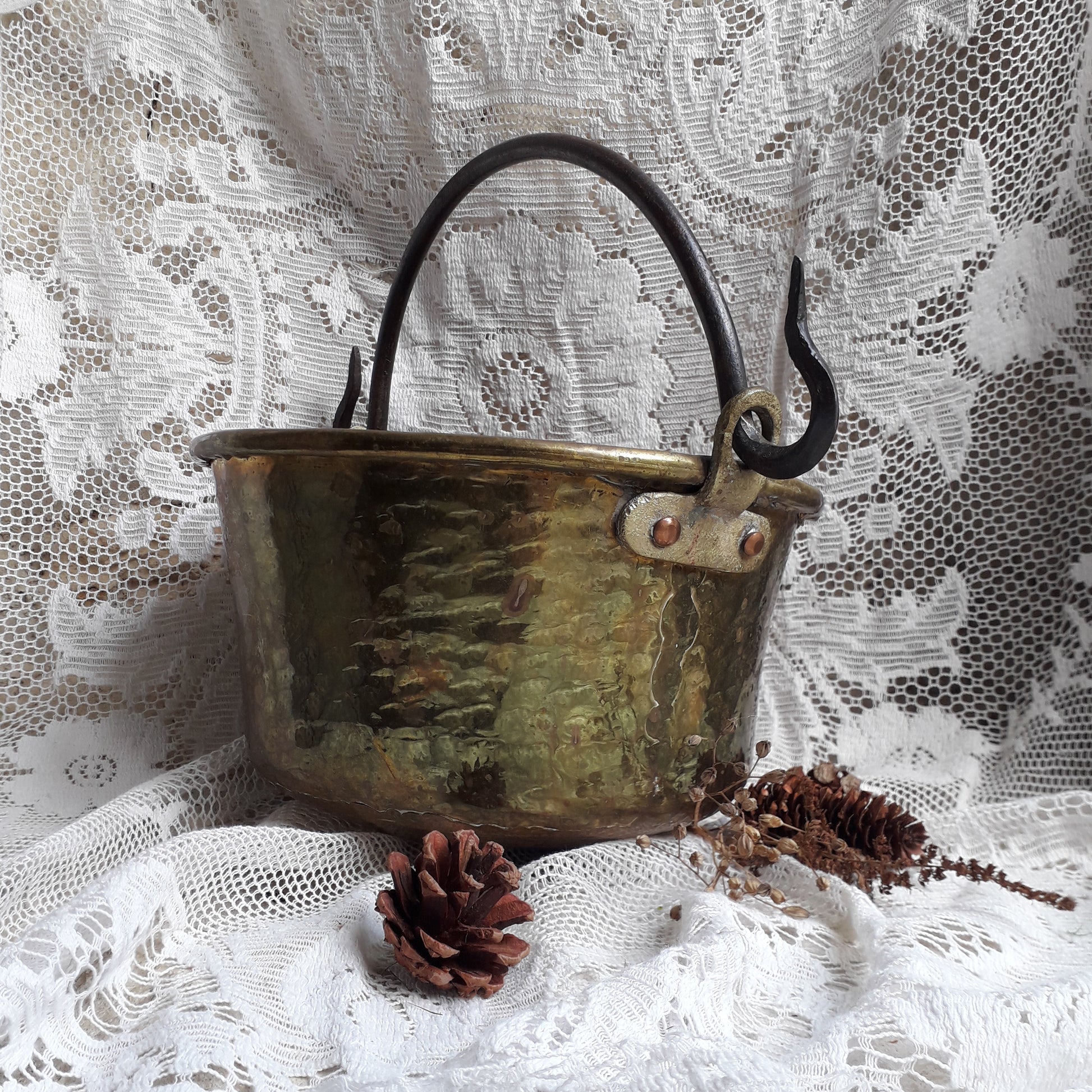 A wonderful little French vintage/antique brass hanging cauldron with an iron handle, a quality piece with substantial weight for its size. This delightful piece was hand-made, the joins beneath clearly visible,which makes it all the more charming. It will make a super piece of home decor or a hanging planter.