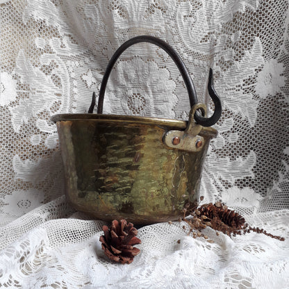 A wonderful little French vintage/antique brass hanging cauldron with an iron handle, a quality piece with substantial weight for its size. This delightful piece was hand-made, the joins beneath clearly visible,which makes it all the more charming. It will make a super piece of home decor or a hanging planter.