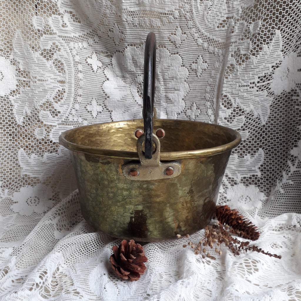 A wonderful little French vintage/antique brass hanging cauldron with an iron handle, a quality piece with substantial weight for its size. This delightful piece was hand-made, the joins beneath clearly visible,which makes it all the more charming. It will make a super piece of home decor or a hanging planter.