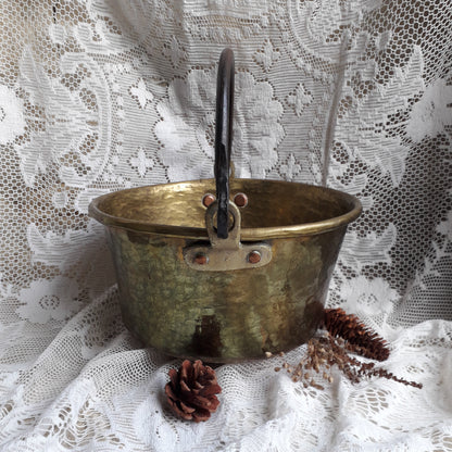 A wonderful little French vintage/antique brass hanging cauldron with an iron handle, a quality piece with substantial weight for its size. This delightful piece was hand-made, the joins beneath clearly visible,which makes it all the more charming. It will make a super piece of home decor or a hanging planter.