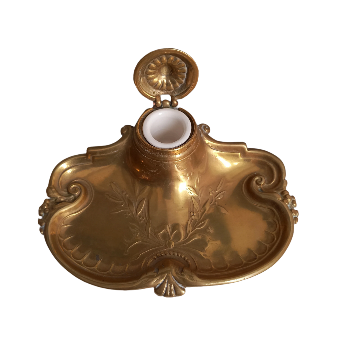 Decorative vintage brass inkwell with white porcelain ink cup