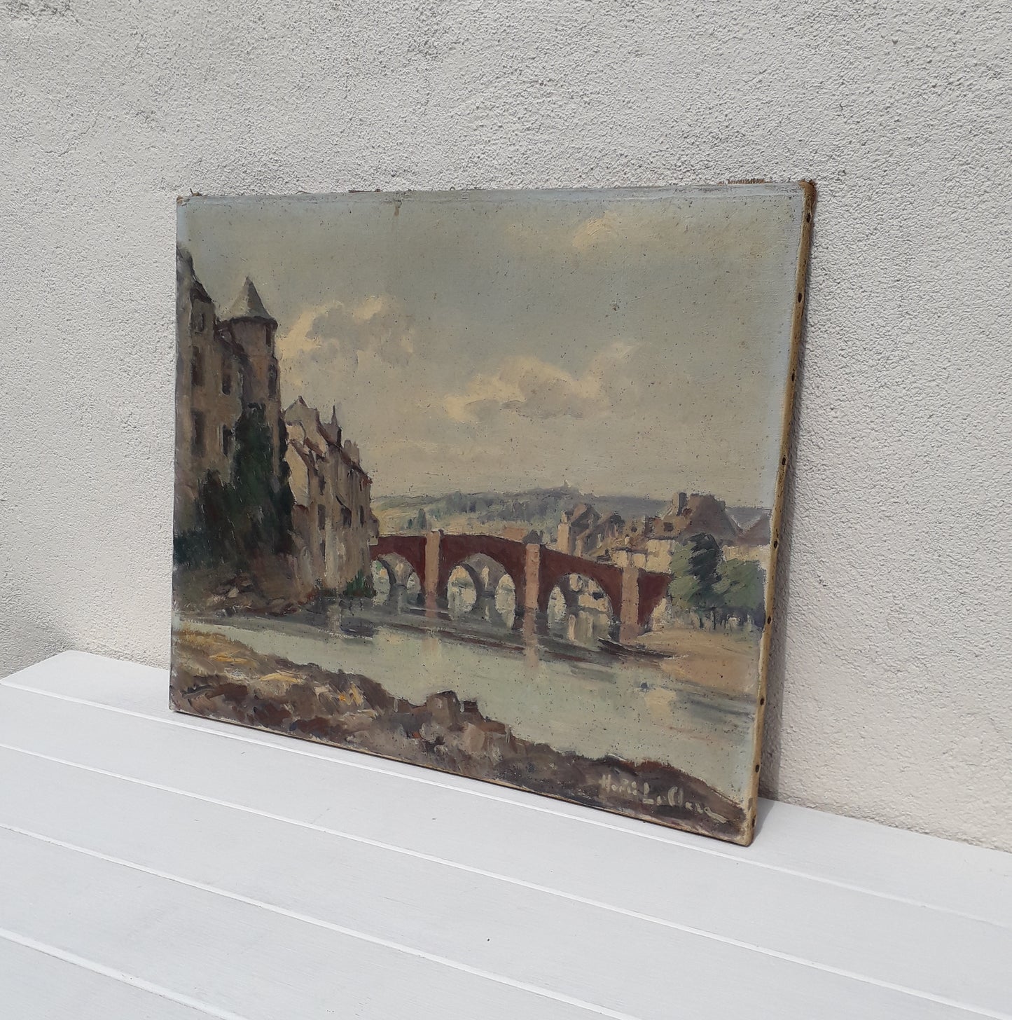 An exciting find and truly fabulous French vintage/antique oil painting depicting the old bridges of Espalion, Aveyron in France. The painting is signed Henri Le Clerc. Stretched canvas on wooden frame; to the rear on the wooden stretcher in very faded pencil is the location - my google search bought up a current view of this scene and little has changed. There is no date, although I guesstimate this painting to have been created in the early to mid 20th century.