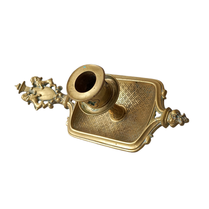 A French antique bronze/brass candle holder or chamber stick, a quality piece that is highly detailed with engraved patterns and a coat of arms with two lovely lions on the handle! This is a heavy piece for its small size and will make super home decor in any interior.