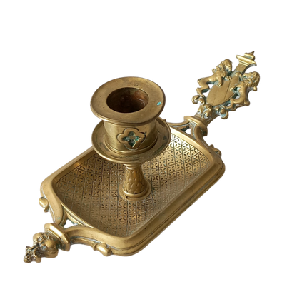 A French antique bronze/brass candle holder or chamber stick, a quality piece that is highly detailed with engraved patterns and a coat of arms with two lovely lions on the handle! This is a heavy piece for its small size and will make super home decor in any interior.