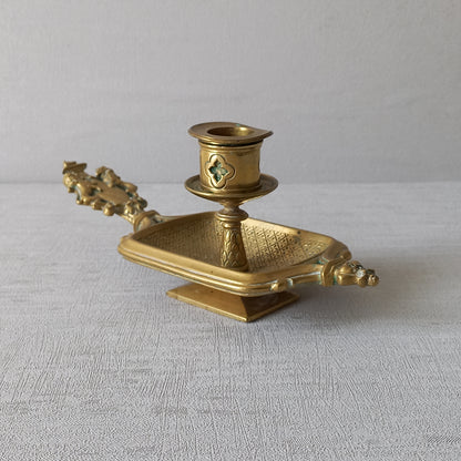 A French antique bronze/brass candle holder or chamber stick, a quality piece that is highly detailed with engraved patterns and a coat of arms with two lovely lions on the handle! This is a heavy piece for its small size and will make super home decor in any interior.