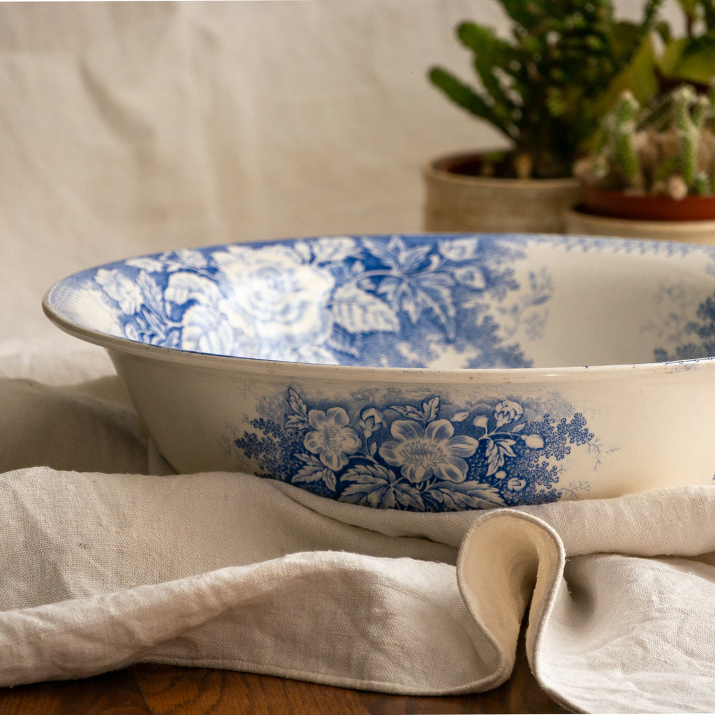 A large and beautiful antique white ironstone bowl or wash basin with blue floral pattern by premier French manufacturer, Sarreguemines.
This piece is circa. 1875 - 1900 so well over 100 years old! 
A stunning piece of original antique ironstone from France that will make excellent home decor.