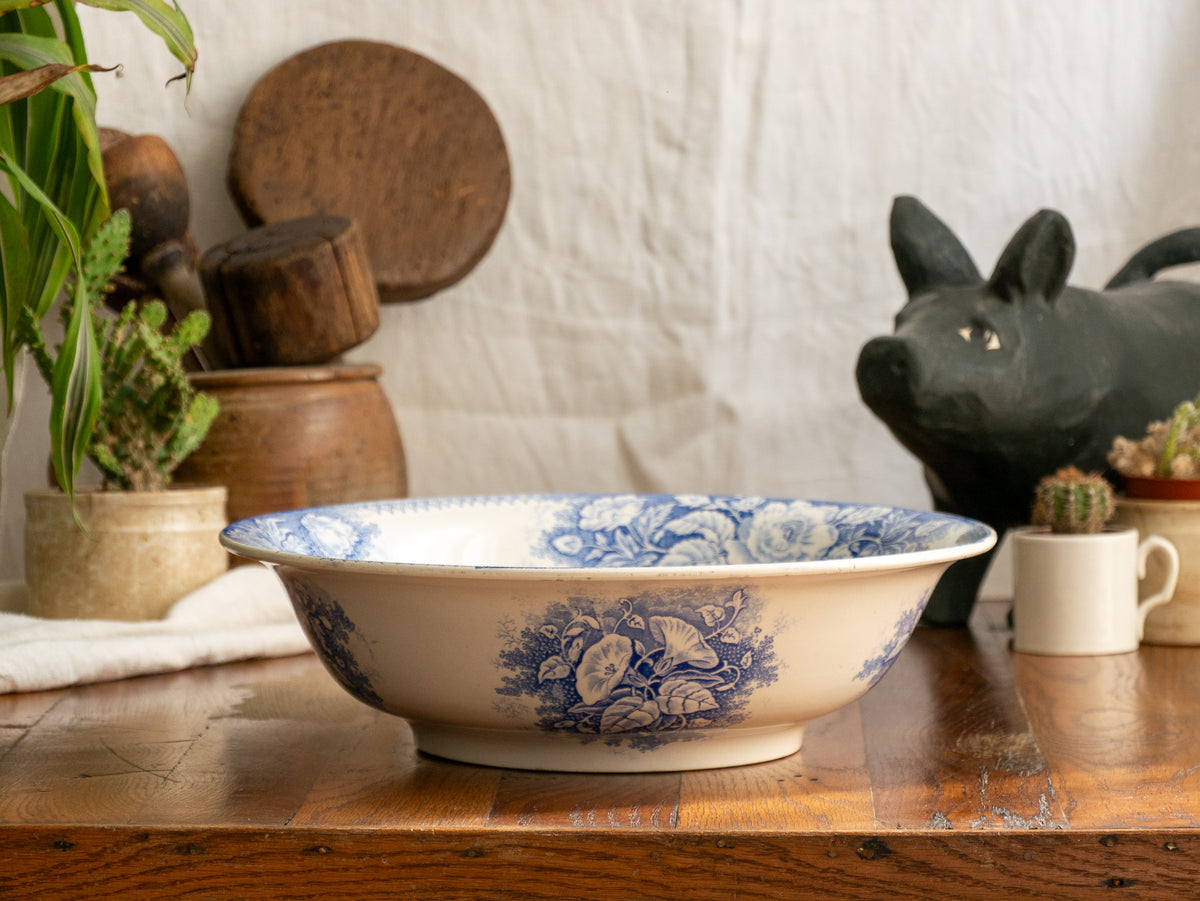 A large and beautiful antique white ironstone bowl or wash basin with blue floral pattern by premier French manufacturer, Sarreguemines.
This piece is circa. 1875 - 1900 so well over 100 years old! 
A stunning piece of original antique ironstone from France that will make excellent home decor.