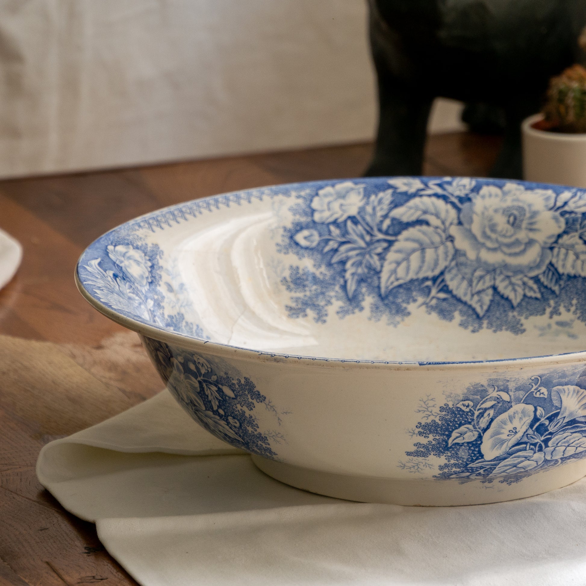 A large and beautiful antique white ironstone bowl or wash basin with blue floral pattern by premier French manufacturer, Sarreguemines.
This piece is circa. 1875 - 1900 so well over 100 years old! 
A stunning piece of original antique ironstone from France that will make excellent home decor.