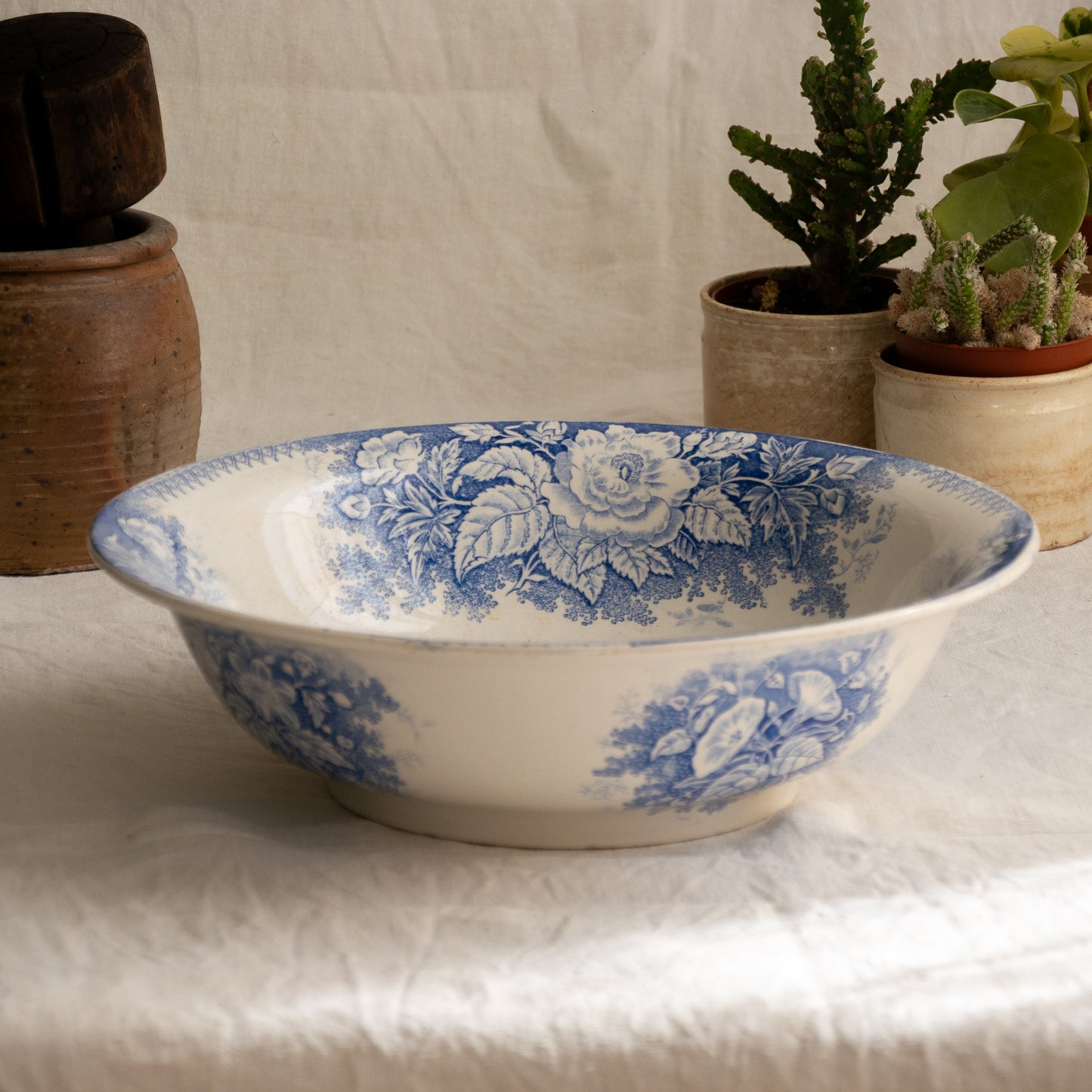 A large and beautiful antique white ironstone bowl or wash basin with blue floral pattern by premier French manufacturer, Sarreguemines.
This piece is circa. 1875 - 1900 so well over 100 years old! 
A stunning piece of original antique ironstone from France that will make excellent home decor.