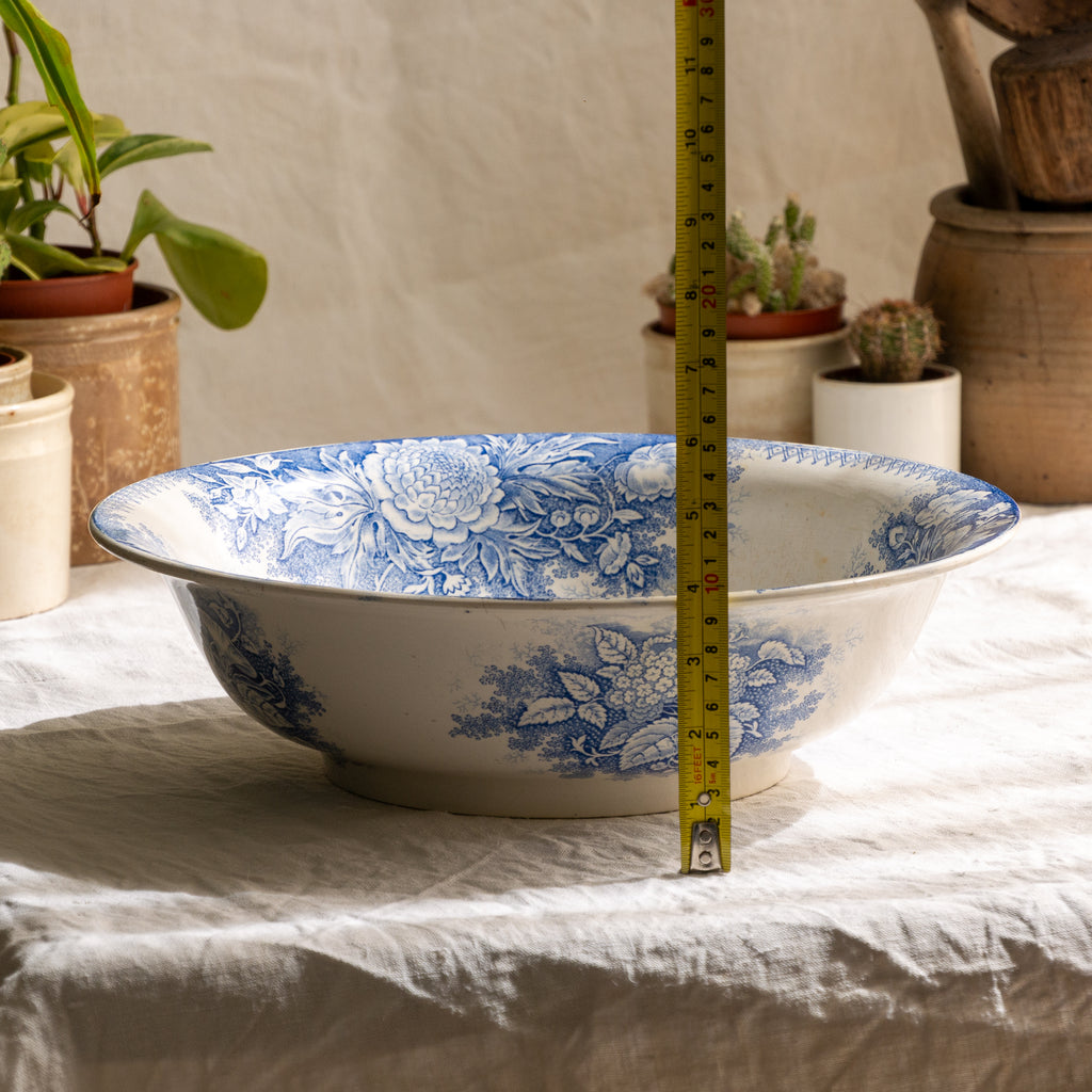 A large and beautiful antique white ironstone bowl or wash basin with blue floral pattern by premier French manufacturer, Sarreguemines.
This piece is circa. 1875 - 1900 so well over 100 years old! 
A stunning piece of original antique ironstone from France that will make excellent home decor.