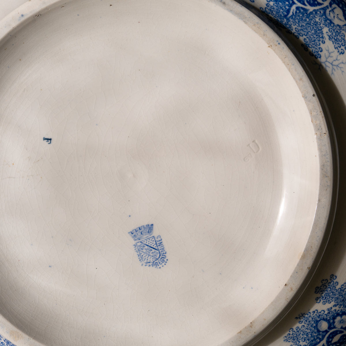 A large and beautiful antique white ironstone bowl or wash basin with blue floral pattern by premier French manufacturer, Sarreguemines.
This piece is circa. 1875 - 1900 so well over 100 years old! 
A stunning piece of original antique ironstone from France that will make excellent home decor.