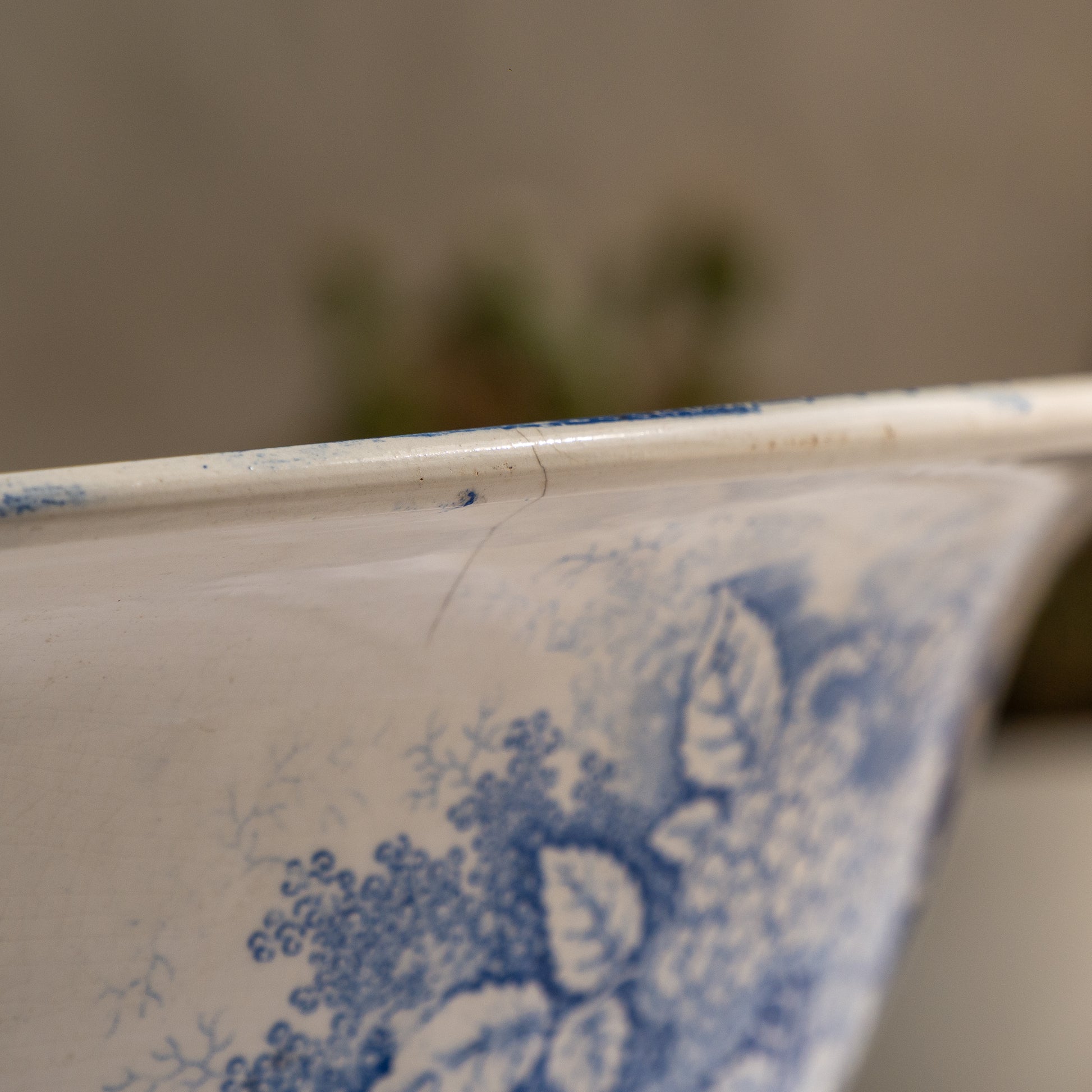 A large and beautiful antique white ironstone bowl or wash basin with blue floral pattern by premier French manufacturer, Sarreguemines.
This piece is circa. 1875 - 1900 so well over 100 years old! 
A stunning piece of original antique ironstone from France that will make excellent home decor.