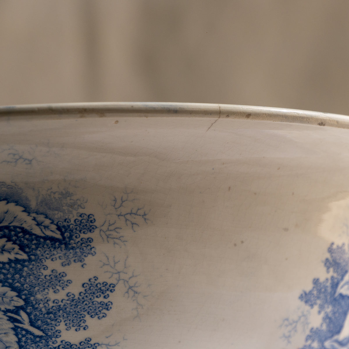 A large and beautiful antique white ironstone bowl or wash basin with blue floral pattern by premier French manufacturer, Sarreguemines.
This piece is circa. 1875 - 1900 so well over 100 years old! 
A stunning piece of original antique ironstone from France that will make excellent home decor.