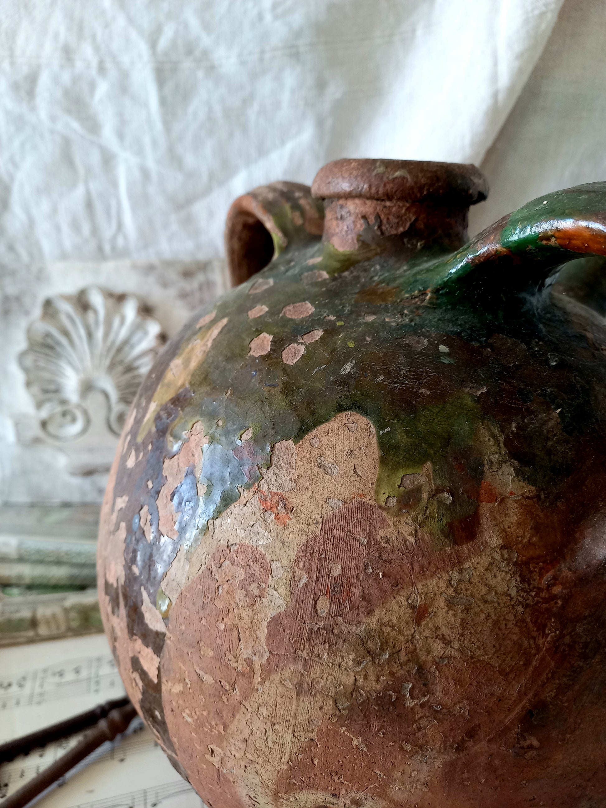 A stunning French antique stoneware terracotta oil preserving jar.