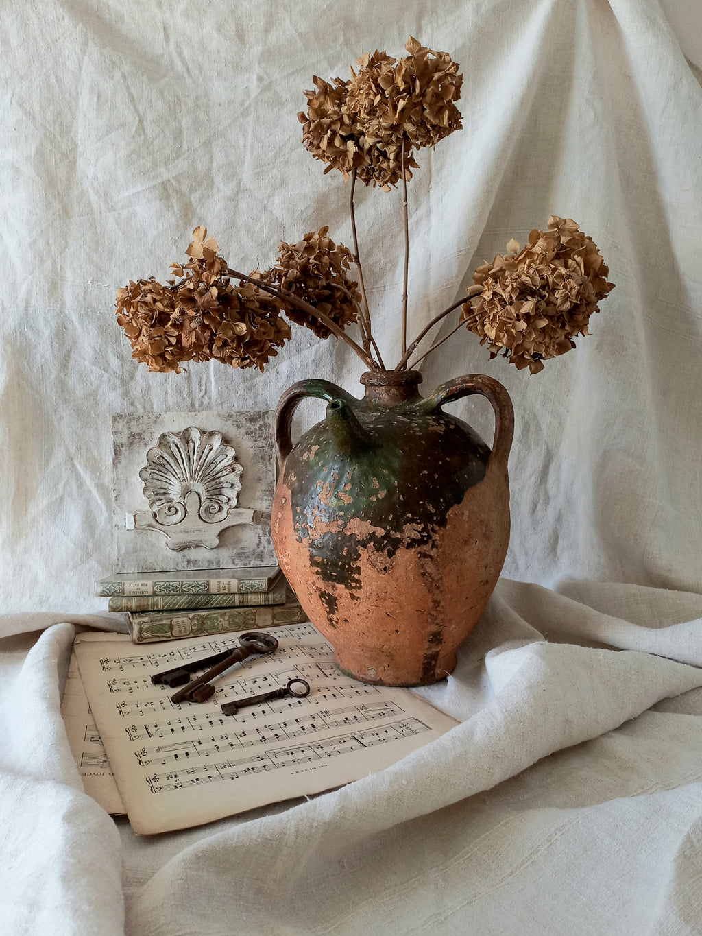 A stunning French antique stoneware terracotta oil preserving jar.