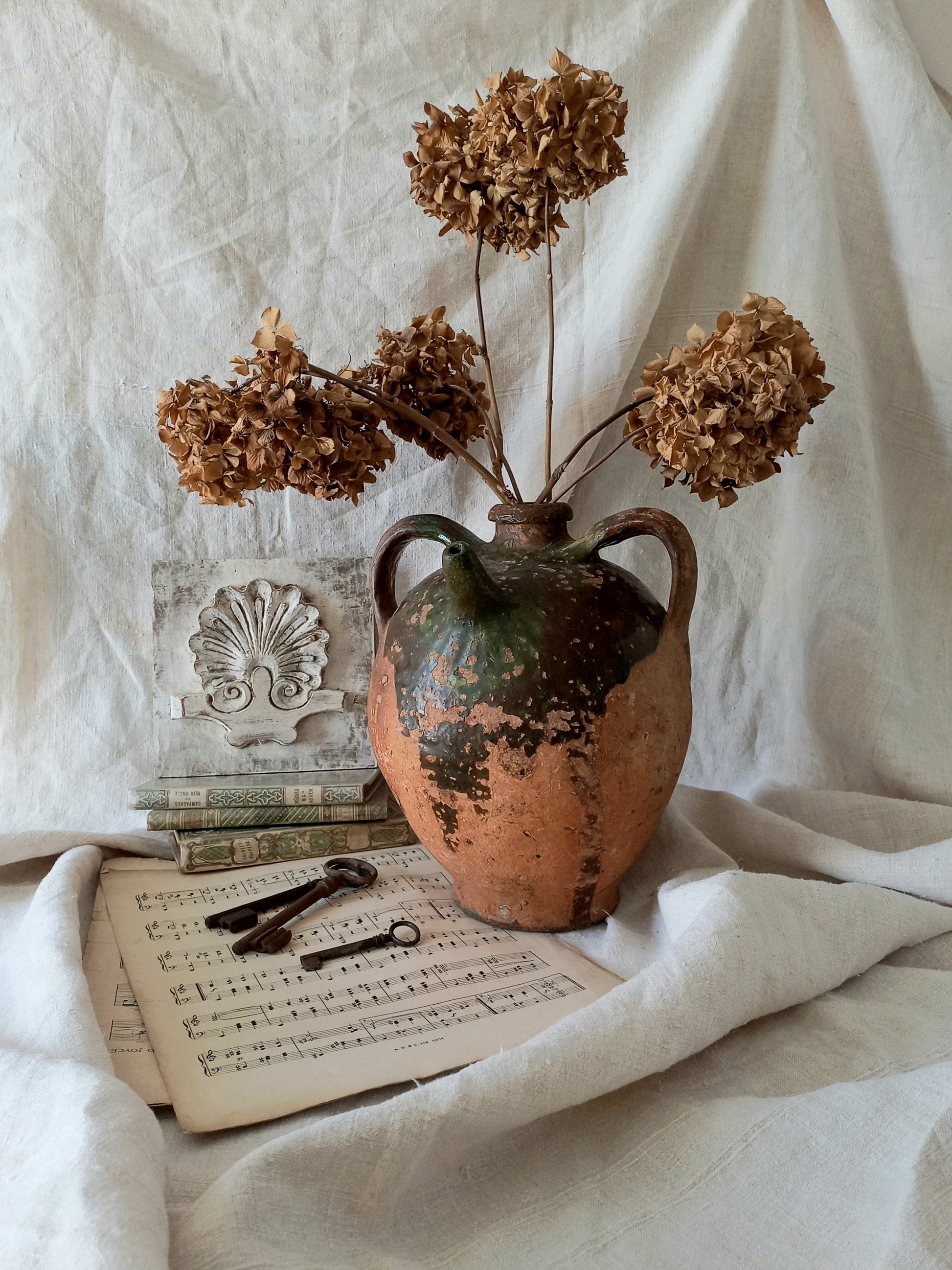A stunning French antique stoneware terracotta oil preserving jar.