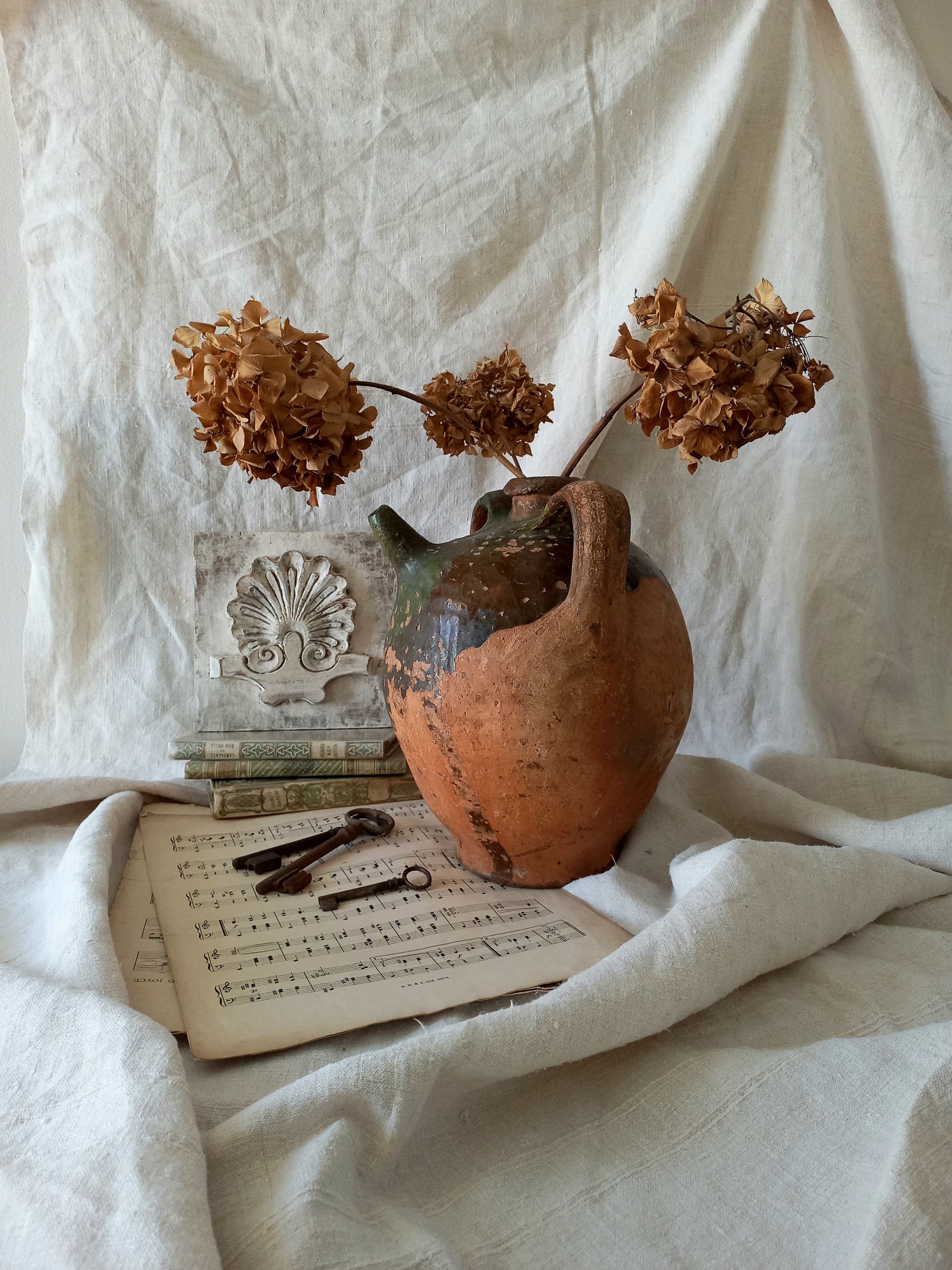A stunning French antique stoneware terracotta oil preserving jar.