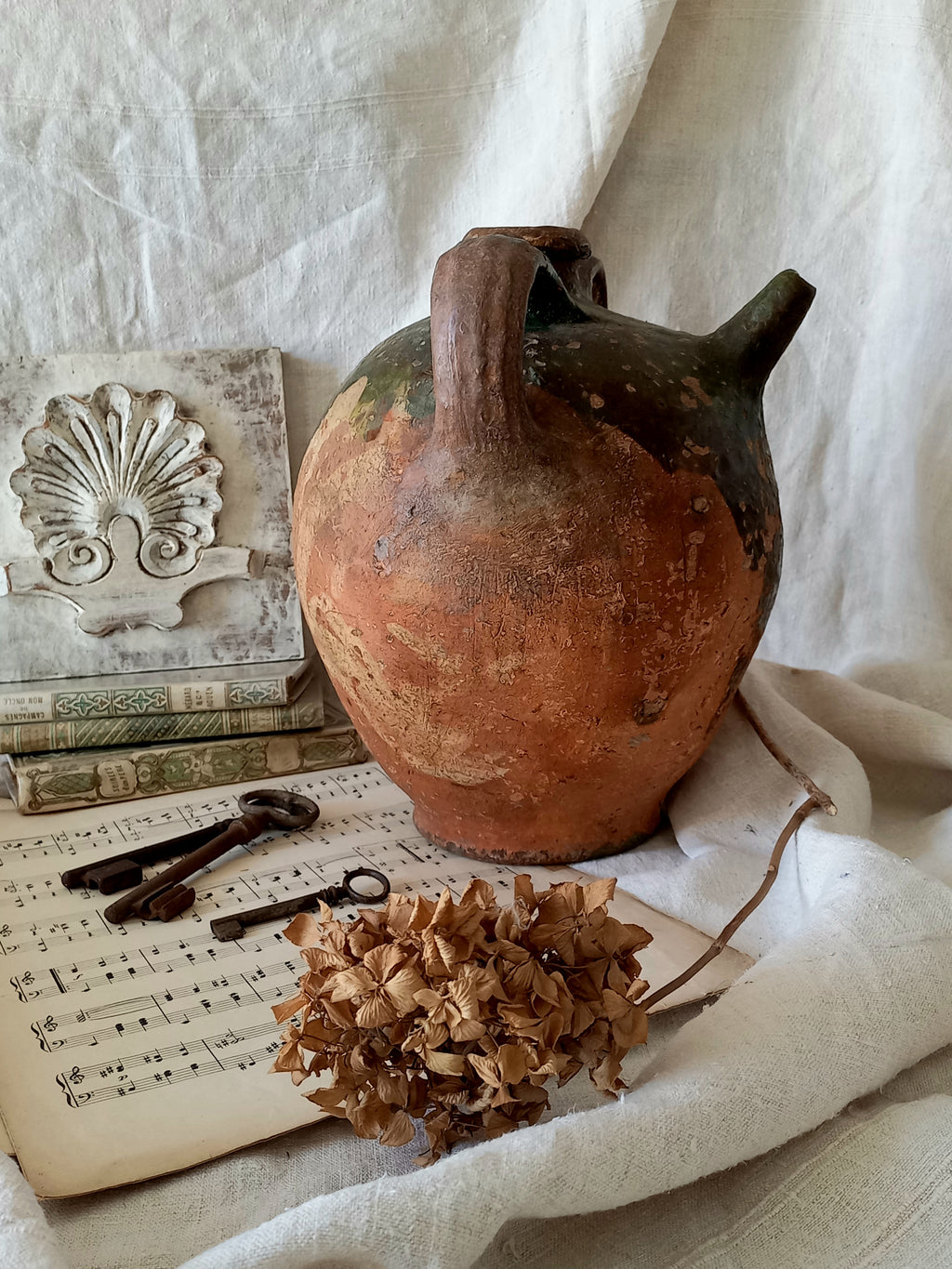 A stunning French antique stoneware terracotta oil preserving jar.