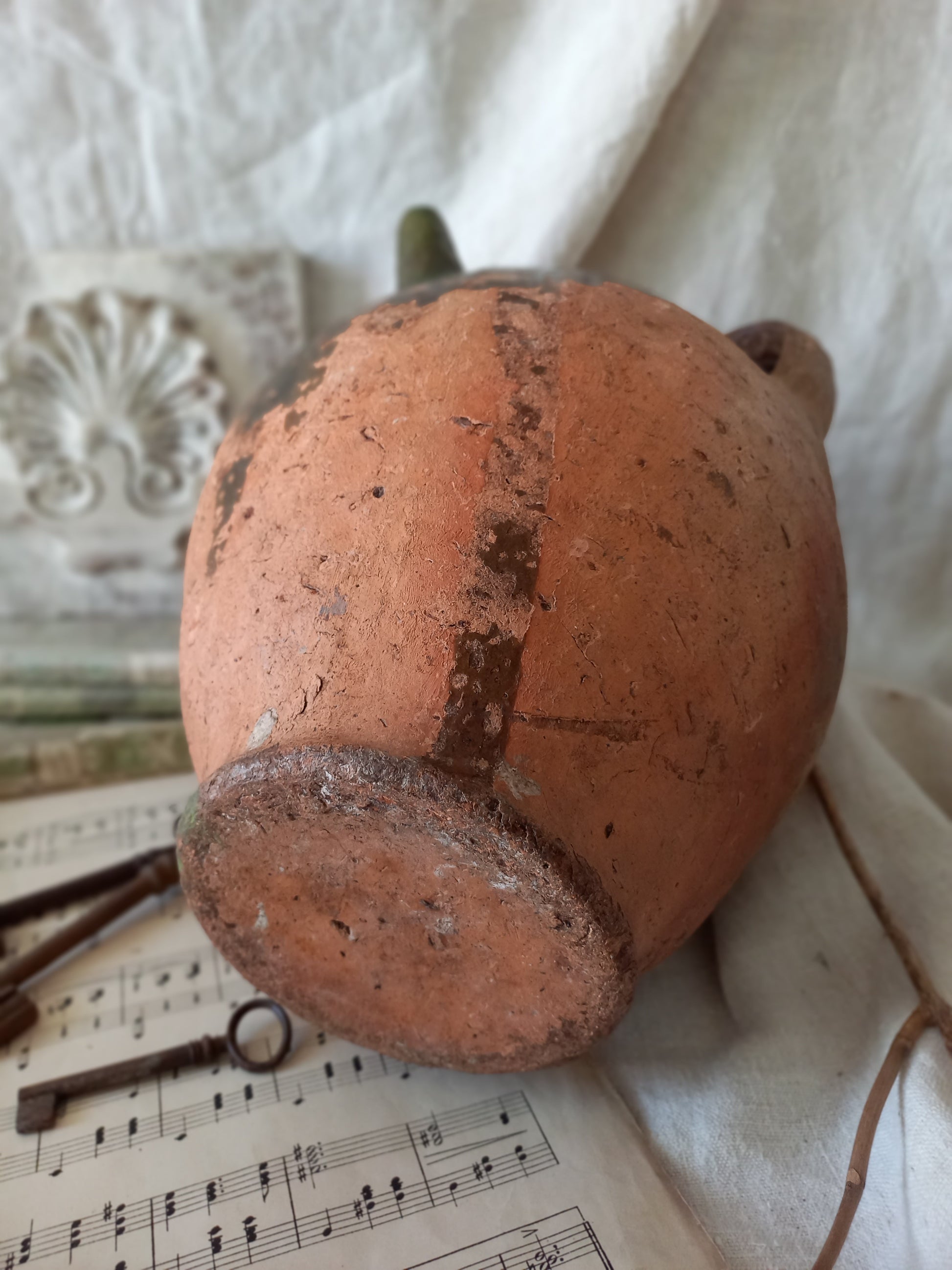 A stunning French antique stoneware terracotta oil preserving jar.
