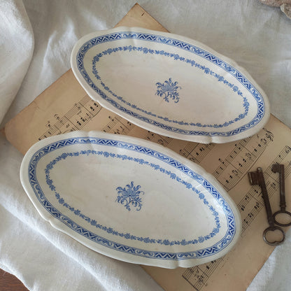 A beautiful pair of French vintage white ironstone side plates or raviers with attractive blue designs. These particular pieces were manufactured by Gien.