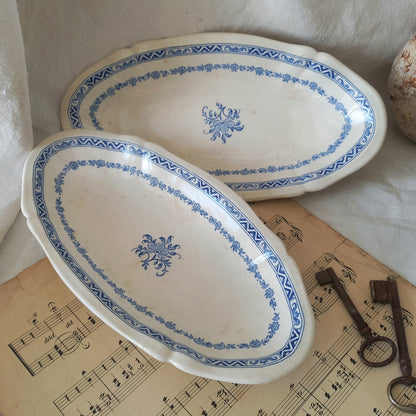 A beautiful pair of French vintage white ironstone side plates or raviers with attractive blue designs. These particular pieces were manufactured by Gien.