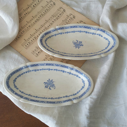 A beautiful pair of French vintage white ironstone side plates or raviers with attractive blue designs. These particular pieces were manufactured by Gien.