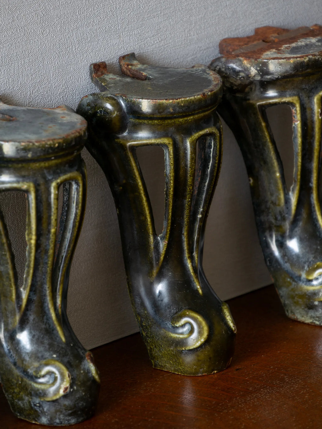 A set of 4 French vintage/antique cast iron bath feet / furniture feet with green enamel finishes, beautifully detailed and decorative pieces perfect for finishing a furniture project.