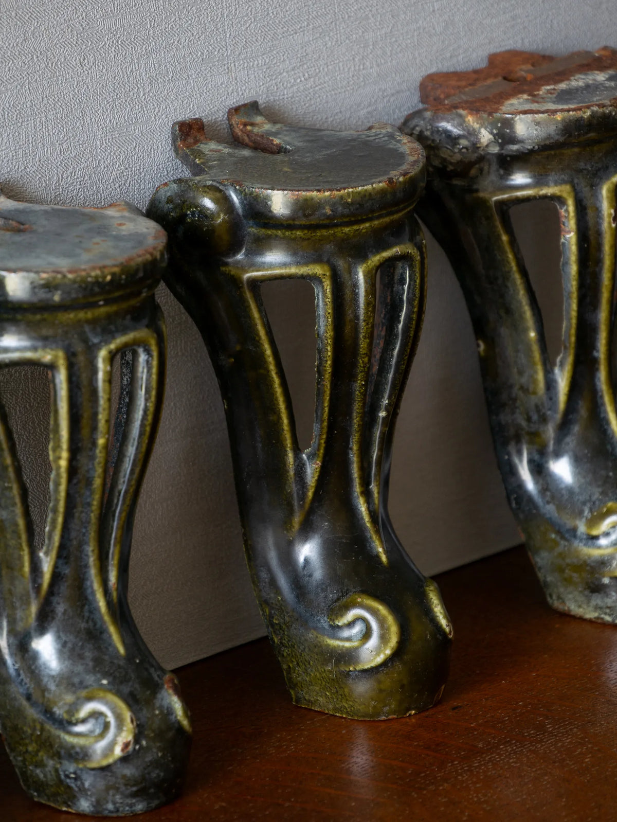 A set of 4 French vintage/antique cast iron bath feet / furniture feet with green enamel finishes, beautifully detailed and decorative pieces perfect for finishing a furniture project.