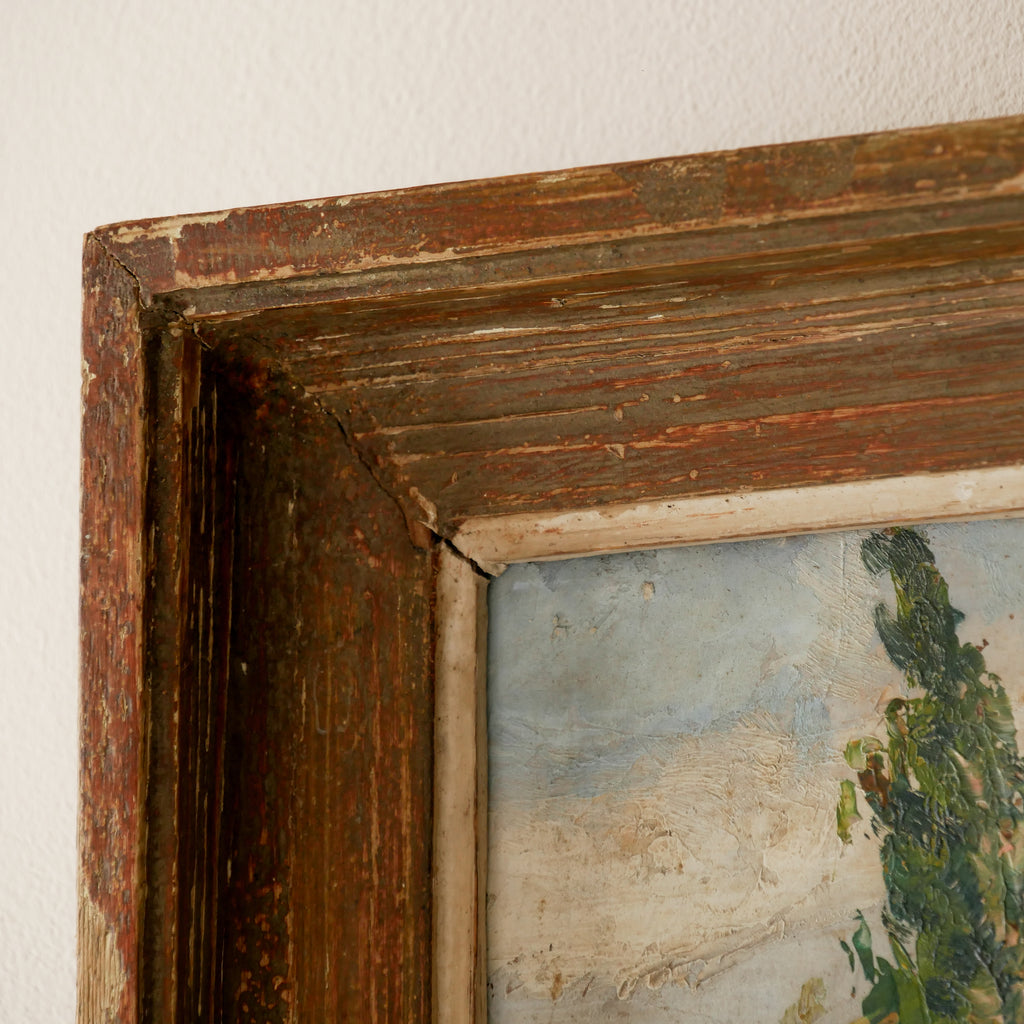 An original vintage landscape oil painting depicting a charming country home in among a wooded area with hills in the background. In the foreground a gentle river reflects the trees in the background.

The painting has been painted by an experienced artist with confident brush strokes - a really wonderful piece of original art.

The painting is presented in an old worn wooden frame which we love and think others will too - it really suits this piece. 