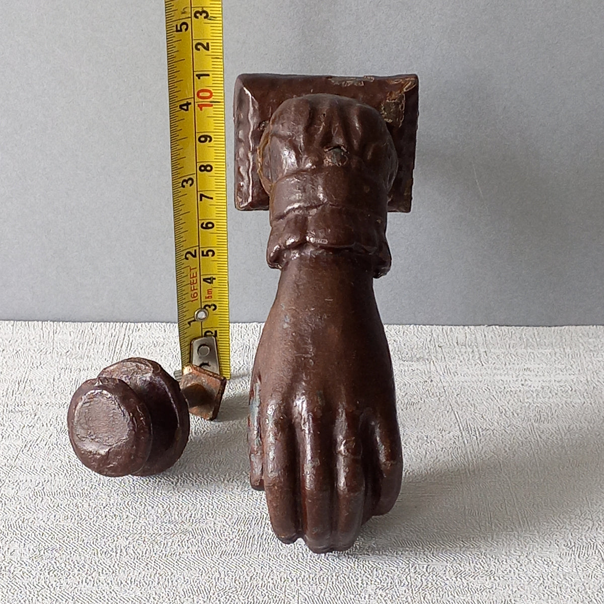 A French decorative antique cast-iron female hand door knocker, an original piece of door decor which is a quality and solid piece with shabby chic finish.