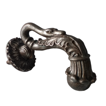 A stunning and large antique cast iron decorative door knocker with an elegant swan's neck and head, a very heavy and original antique piece purchased in south west France. 