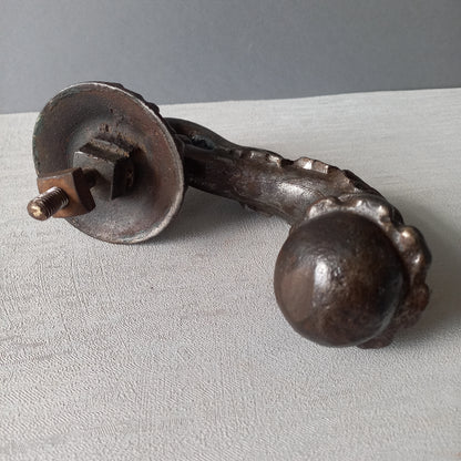 A stunning and large antique cast iron decorative door knocker with an elegant swan's neck and head, a very heavy and original antique piece purchased in south west France. 