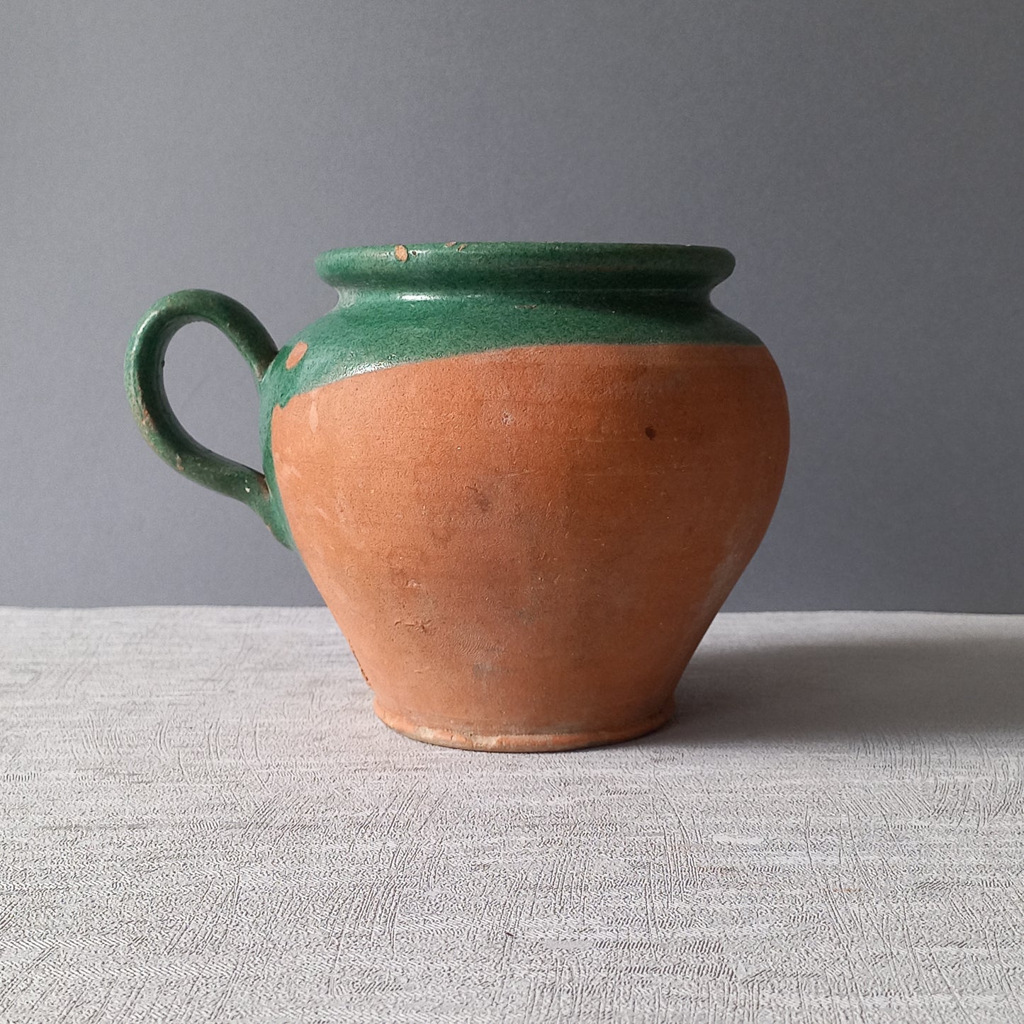 Small French vintage pottery jug with green glazed interior