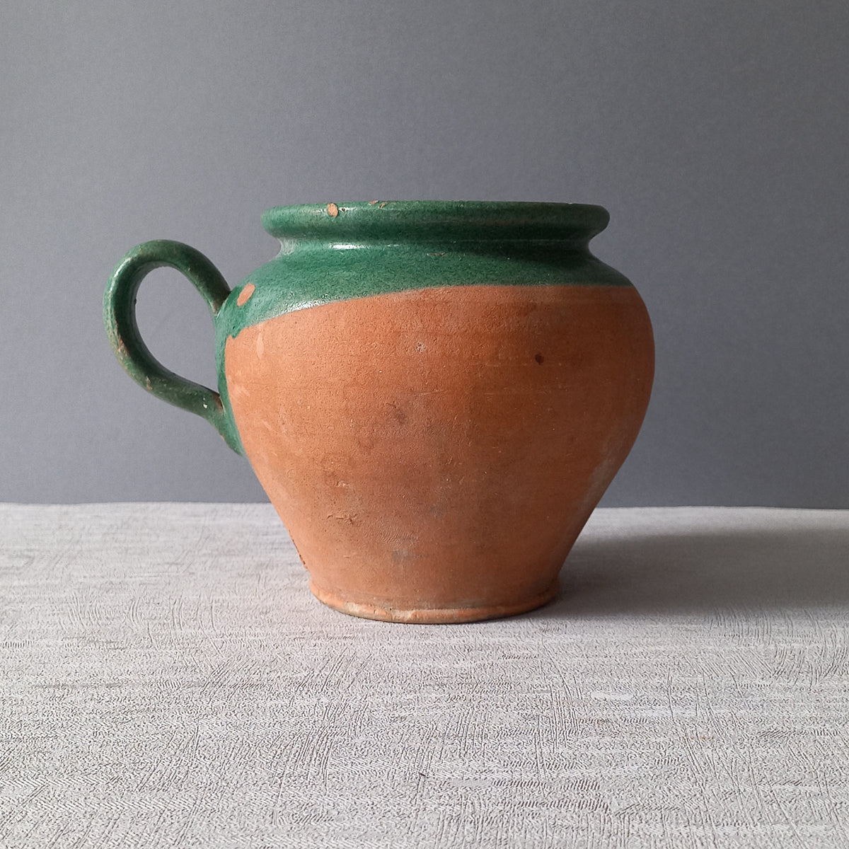 Small French vintage pottery jug with green glazed interior