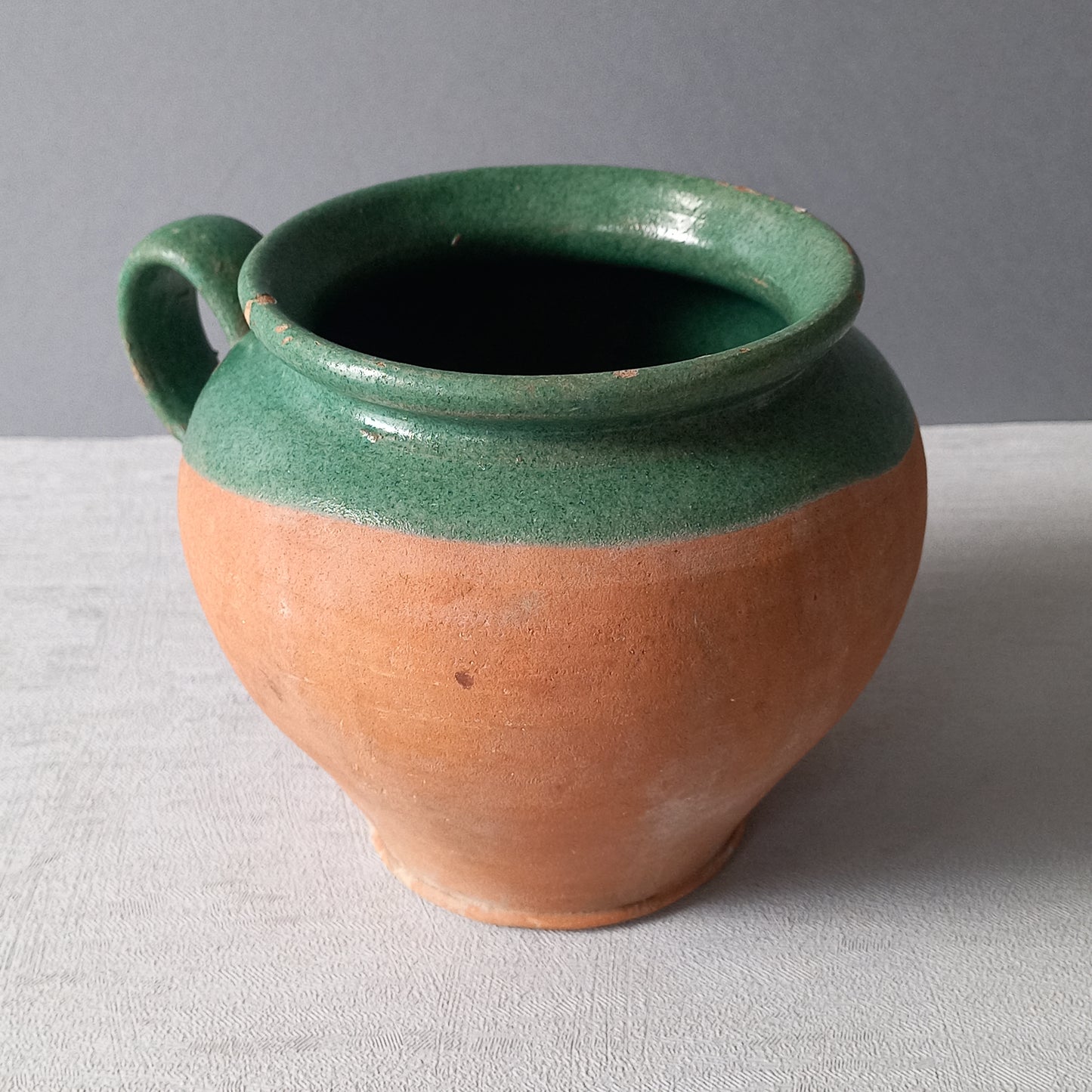 Small French vintage pottery jug with green glazed interior