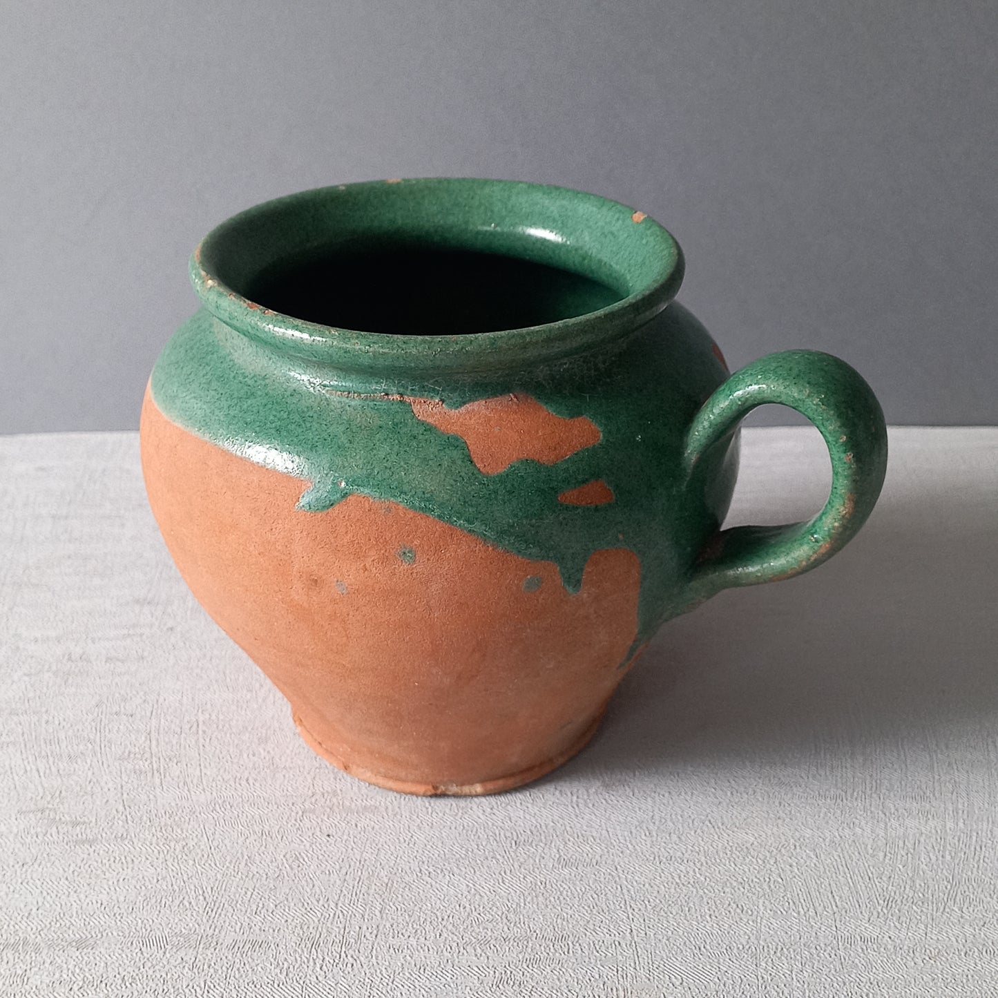Small French vintage pottery jug with green glazed interior