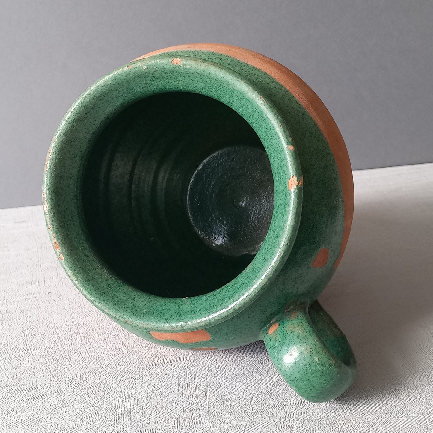 Small French vintage pottery jug with green glazed interior