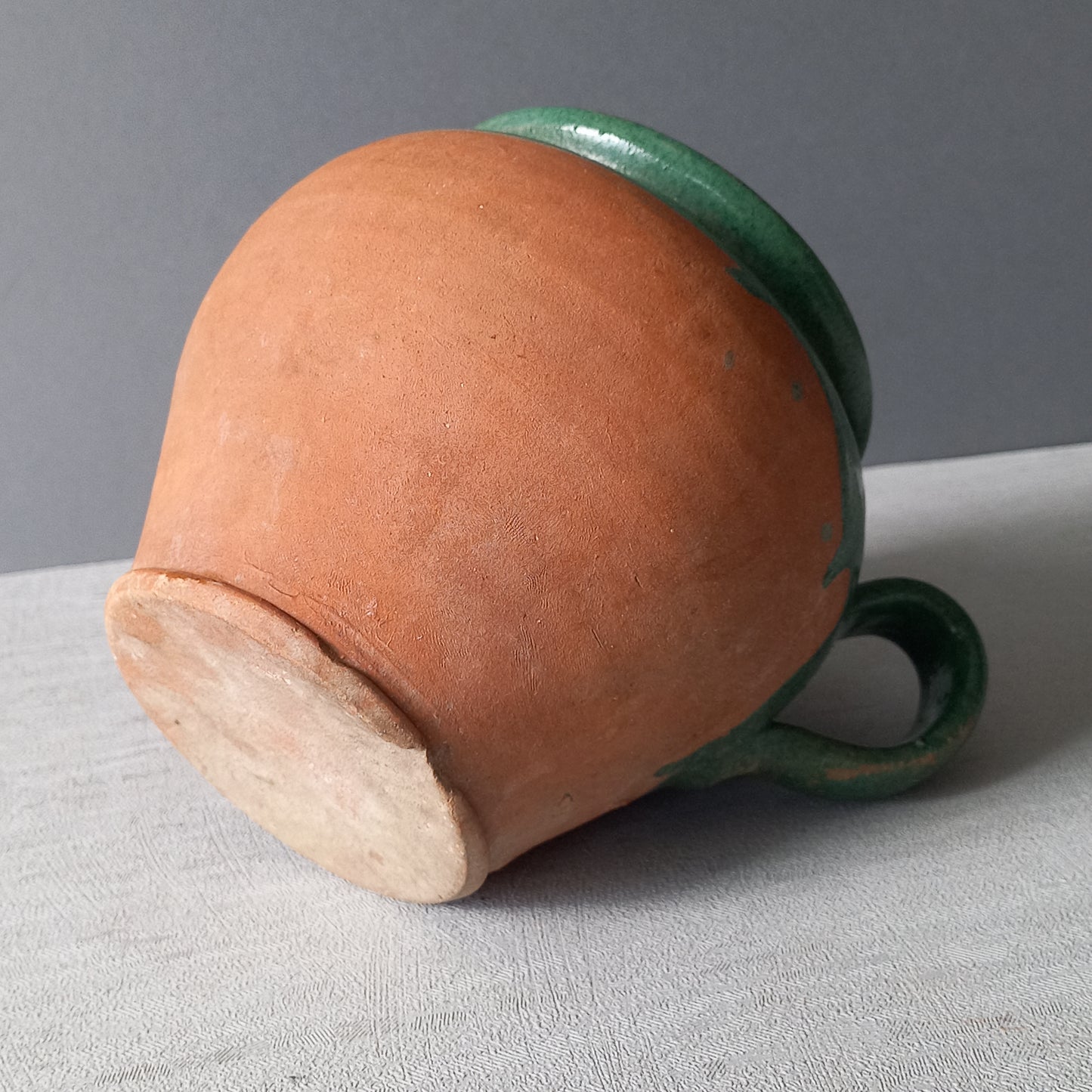 Small French vintage pottery jug with green glazed interior