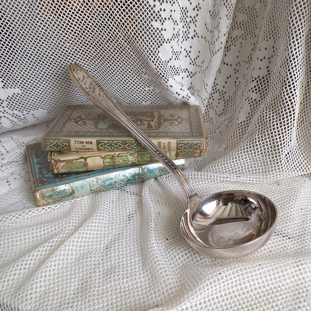 An elegant French vintage/antique silver-plated ladle with maker's stamps - a really nice decorative piece of flatware with a heavy, quality feel.